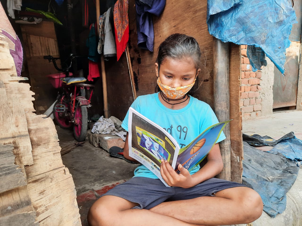 A child studying, preparing to become an all-rounder student!